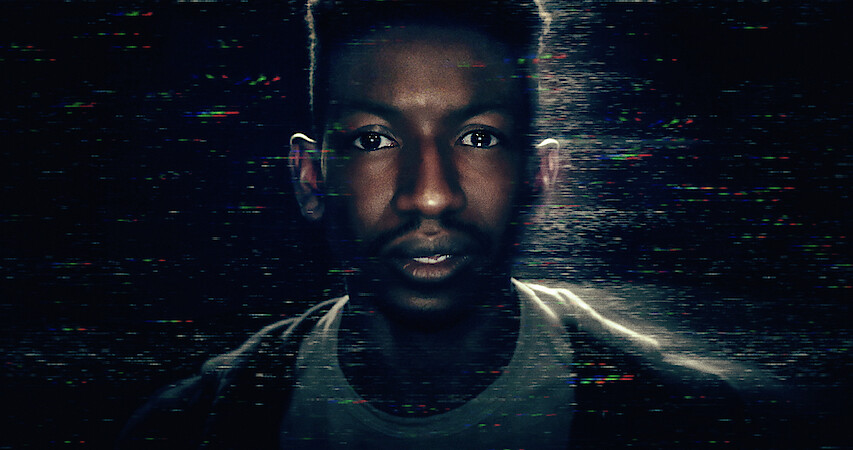 An image of Mamoudou Athie playing Dan Turner in Archive 81