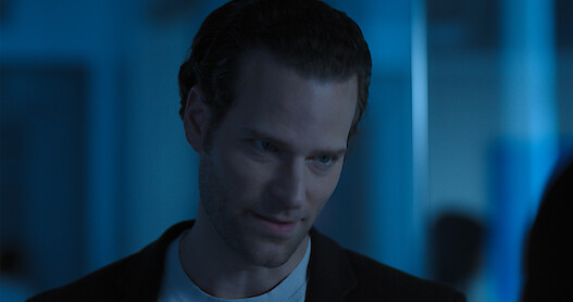 Close up on a menacing looking man