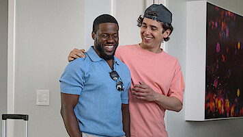 Two men smiling and laughing in the movie 72 Hours