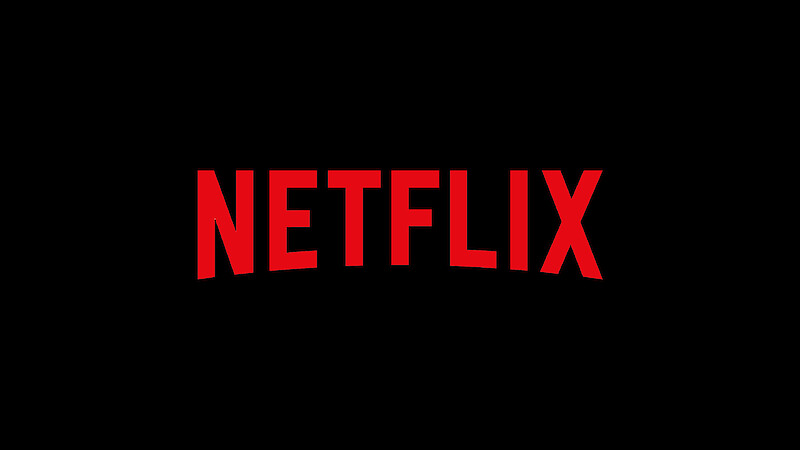 Red Netflix logo centered on a solid black background, minimalistic design with no additional elements or scenery.
