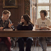 Harry Trevaldwyn as Charlie, Sofia Carson as Anna and Esmé Kingdom as Maggie talk in a classroom in 'My Oxford Year.'