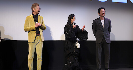 Lee Sun Jin, Ali Wong and Steven Yeun on stage