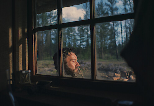 Joel Edgerton as Robert Grainier in Train Dreams.