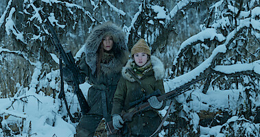 Jennifer Lopez and Lucy Paez stand in the Alaskan wilderness in a still from 'The Mother'