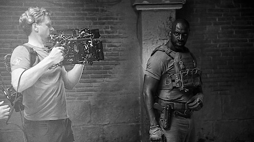 Behind the scenes image of Omar Sy on the set of 'Mercenary'