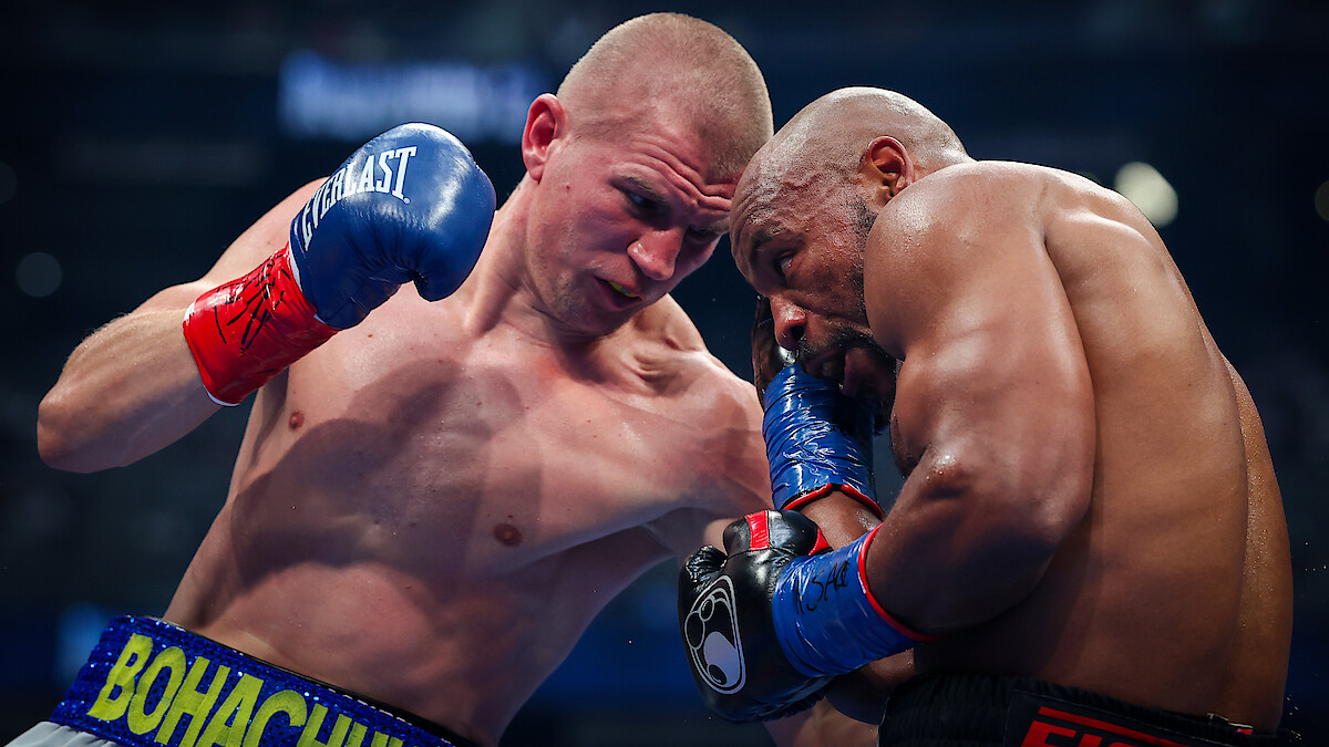 Serhii Bohachuk lands a left at Brandon Adams during their middleweight bout at Allegiant Stadium.