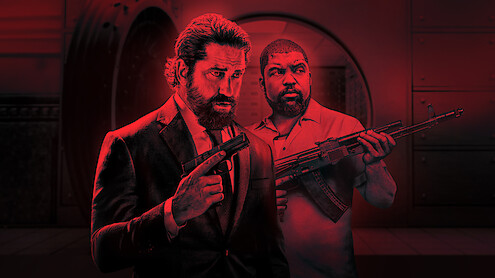  Gerard Butler and O'Shea Jackson Jr. each hold a gun in this promotional image from 'Den of Thieves 2: Pantera."