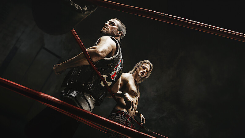 Story art for the wrestling show 'Heels', featuring two men in the ring.