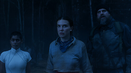 Linnea Berthelsen as Kali, Millie Bobby Brown as Eleven and David Harbour as Jim Hopper in 'Stranger Things 5'
