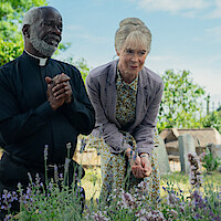 Joseph Marcell as Father Mackie, Celia Imrie as Joyce, and Helen Mirren as Elizabeth in 'The Thursday Murder Club'