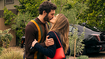 Adam Brody as Noah and Kristen Bell as Joanne kiss in 'Nobody Wants This' Season 2.