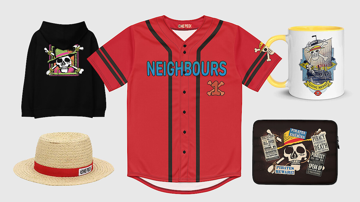 Group of assorted merchandise on a light background: black hoodie, straw hat, red "NEIGHBOURS" jersey, pirate-themed mug, and a black pouch with skull and pirate graphics.