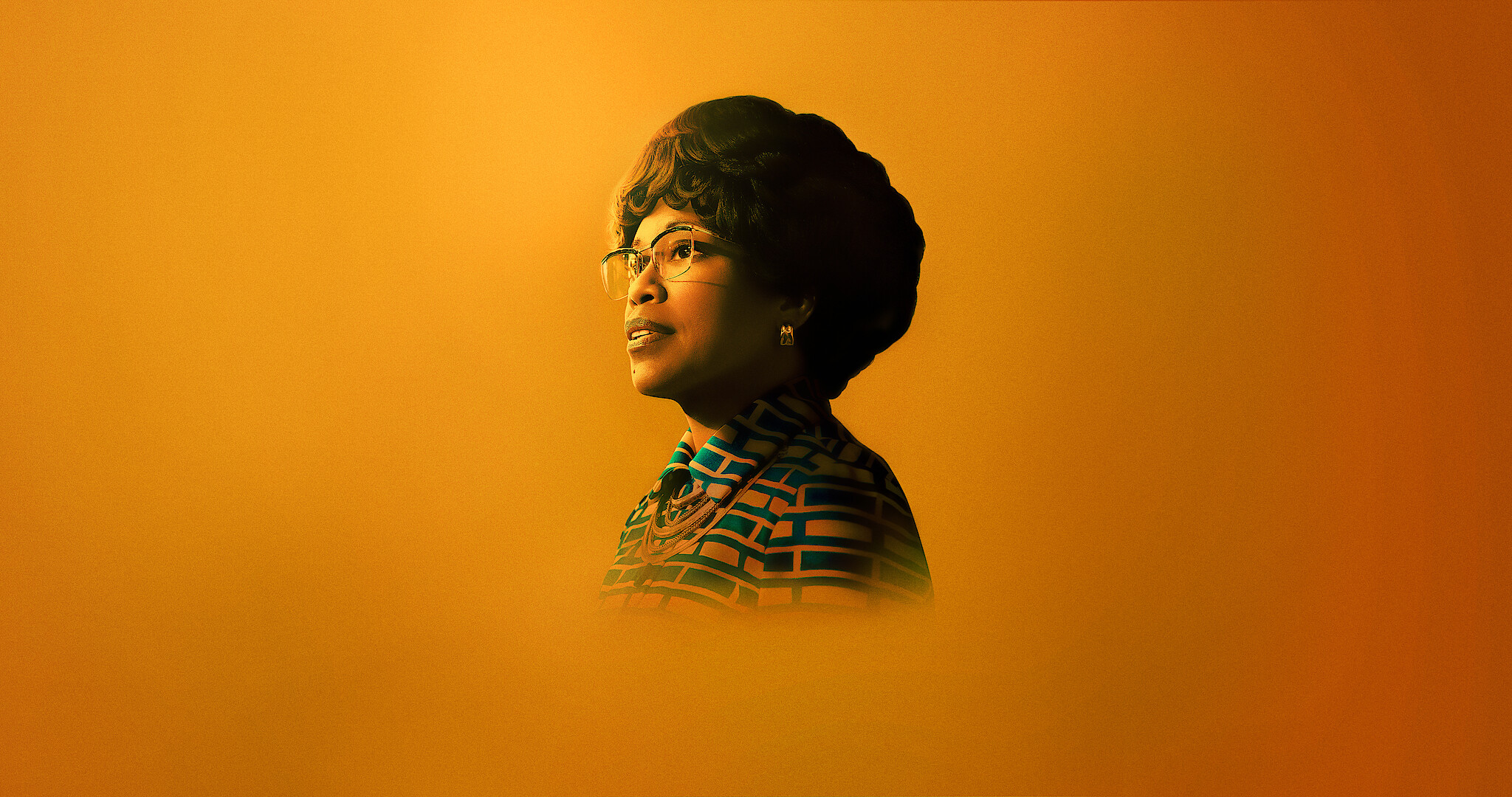 Regina King as Shirley Chisholm on a orange background