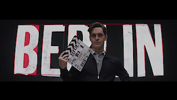 Pedro Alonso using a film clapboard