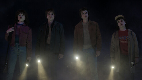 Natalia Dyer as Nancy Wheeler, Charlie Heaton as Jonathan Byers, Joe Keery as Steve Harrington, and Gaten Matarazzo as Dustin Henderson in 'Stranger Things 5'