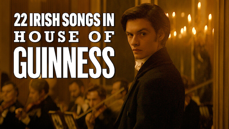 Louis Partridge in front of an orchestra with the title of that reads 22 Irish Songs In House of Guinness