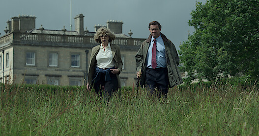 Man and women walking in feild