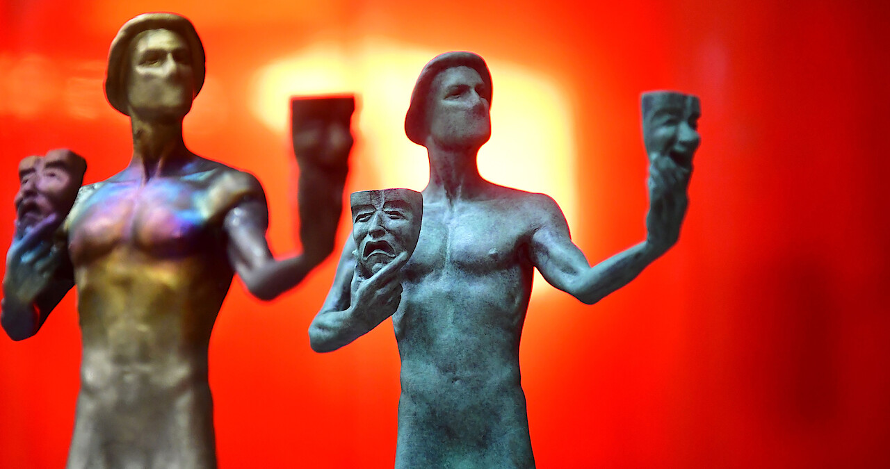 Two bronze SAG statues.