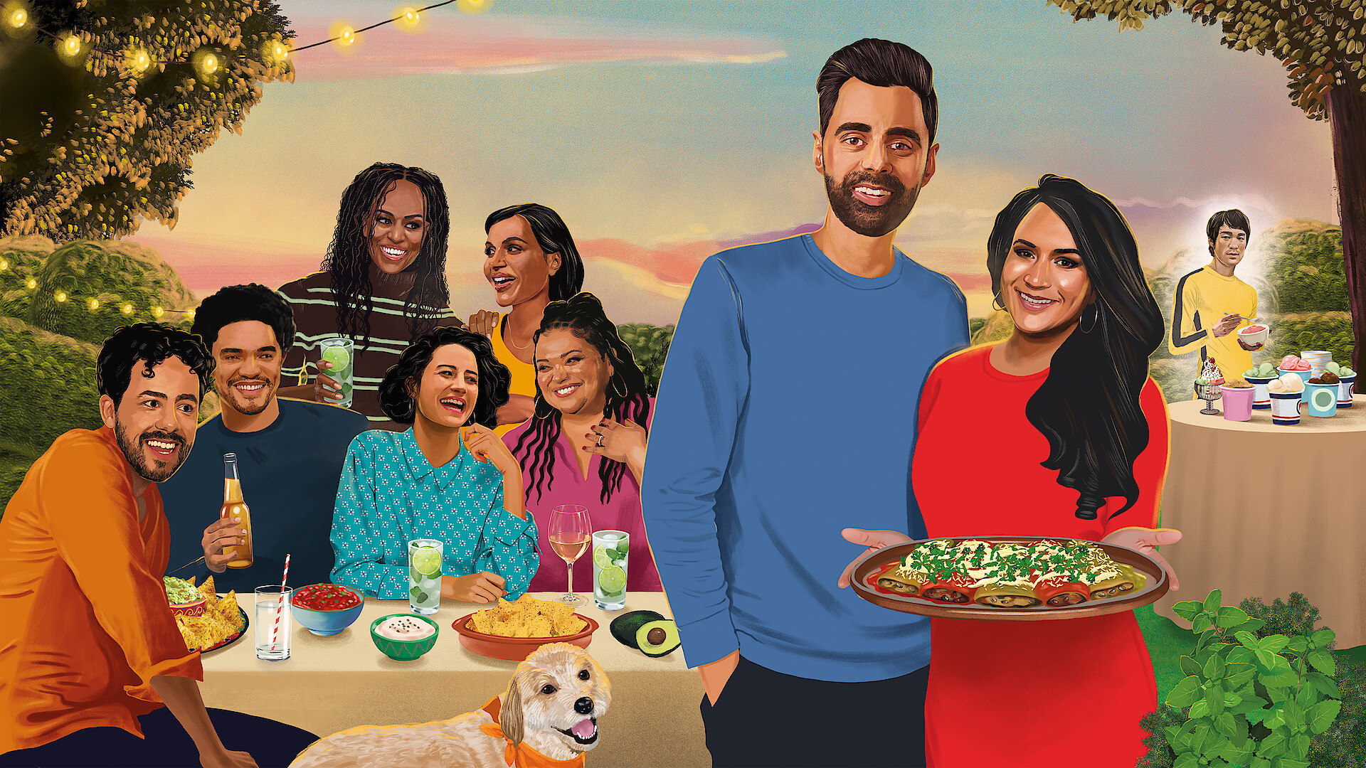 A group of people enjoying an outdoor dinner party with drinks and food, set in a garden with string lights. A couple stands in the front holding a large dish, while a dog sits beside them and more food is on a table in the background.