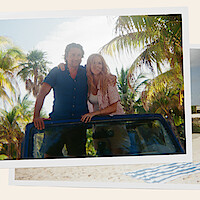 Mel and Jack standing arm in arm in a Jeep while in Tulum on their honeymoon 