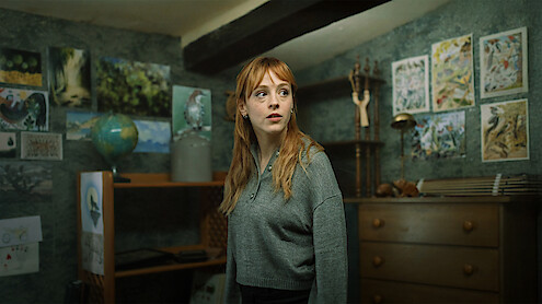 Catalina Sopelana as Clara takes in her heart donor's room in 'The Crystal Cuckoo.'