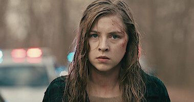 Hermione Corfield as Sawyer has a bloodied face in 'Rust Creek.' 