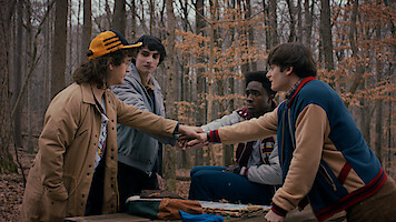 Gaten Matarazzo as Dustin, Finn Wolfhard as Mike, Caleb MacLaughlin as Lucas, and Noah Schnapp as Will in 'Stranger Things' Season 5.