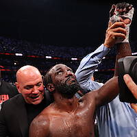 Dana White, CEO and president of the UFC, awards the belt to Terence Crawford after Crawford won by unanimous decision against Canelo Alvarez.