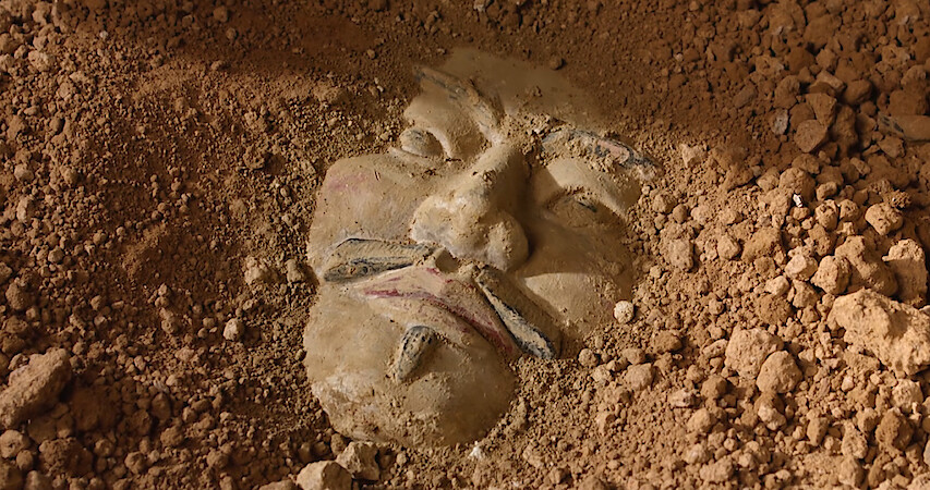 A buried terracotta warrior as seen in the documentary 'Mysteries of the Terracotta Warriors'