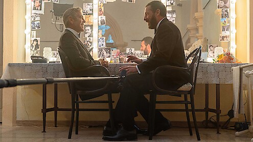 George Clooney as Jay Kelly and Adam Sandler as Ron on the set of 'Jay Kelly.'