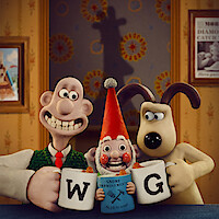 Wallace and Gromit clink mugs with a gnome sitting between then.