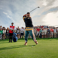 Benito Antonio Martínez Ocasio as Busboy and Adam Sandler as Happy Gilmore in 'Happy Gilmore 2'