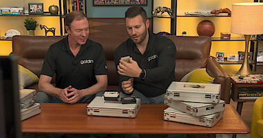 Ken Goldin and his associate in a still image from 'King of Collectibles: The Goldin Touch' Season 1