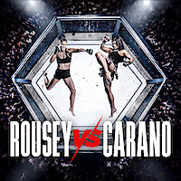 Ronda Rousey and Gina Carano face each other off inside a boxing ring