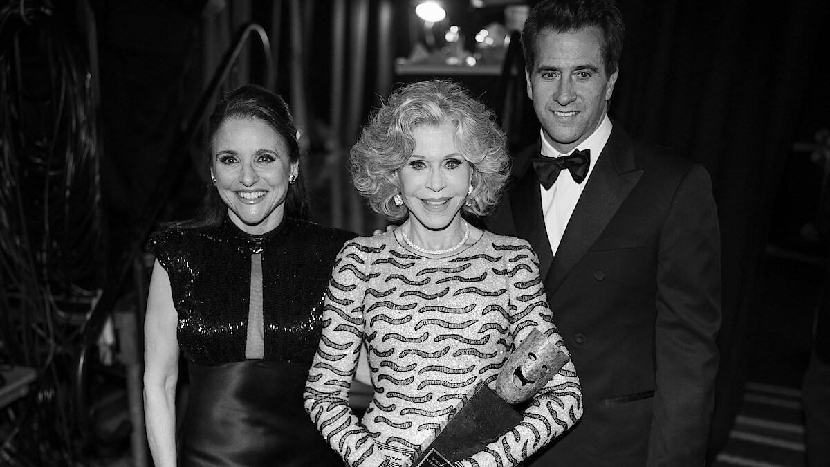 Jane Fonda holding her Life Achievement Award flanked by Julia Louis-Dreyfus and Troy Garity at the 31st Annual Screen Actors Guild Awards at the Shrine Auditorium & Expo Hall.