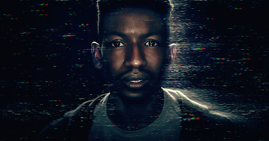 An image of Mamoudou Athie playing Dan Turner in Archive 81