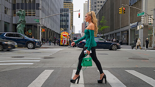 Eleonora Srugo crossing the street in New York.