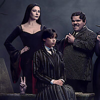 The Addams Family poses for a family portrait in 'Wednesday' Season 2