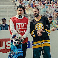 Quinn Stiller as Will Zalatoris Caddie, Benito Antonio Martínez Ocasio as Busboy, Adam Sandler as Happy Gilmore and Justin Thomas as himself in 'Happy Gilmore 2'