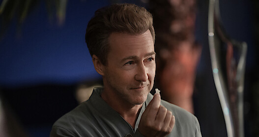Edward Norton holding a piece of Klear