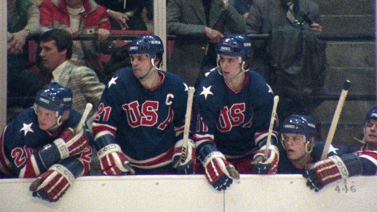 Team USA watches the match from the bench in 'Miracle: The Boys of '80.'
