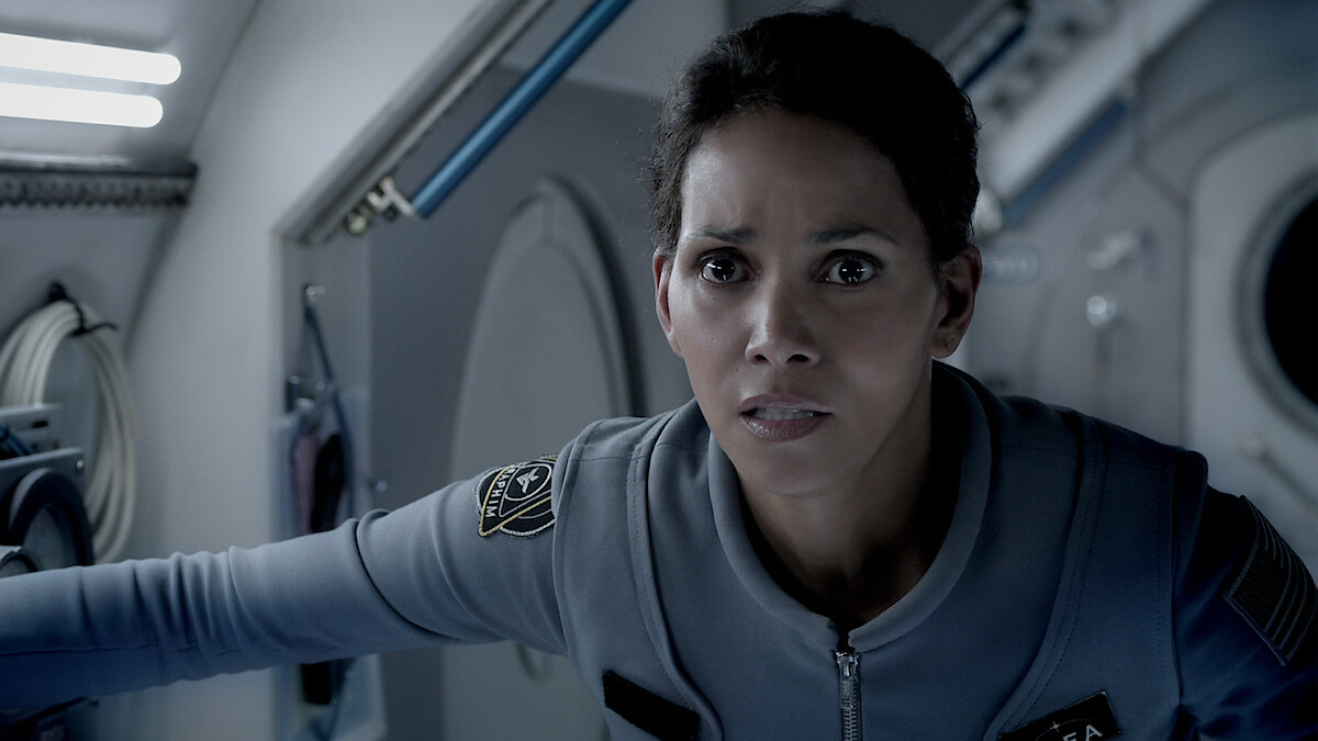 Halle Berry wears an astronaut uniform in a space shuttle in an image from 'Extant.'