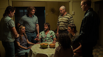 Phoebe Tonkin as Frances Bell, Travis Fimmel as Lyle Orlik, Lee Halley as Gus Bell, Christopher James Baker as Ivan Kroll in 'Boy Swallows Universe.'