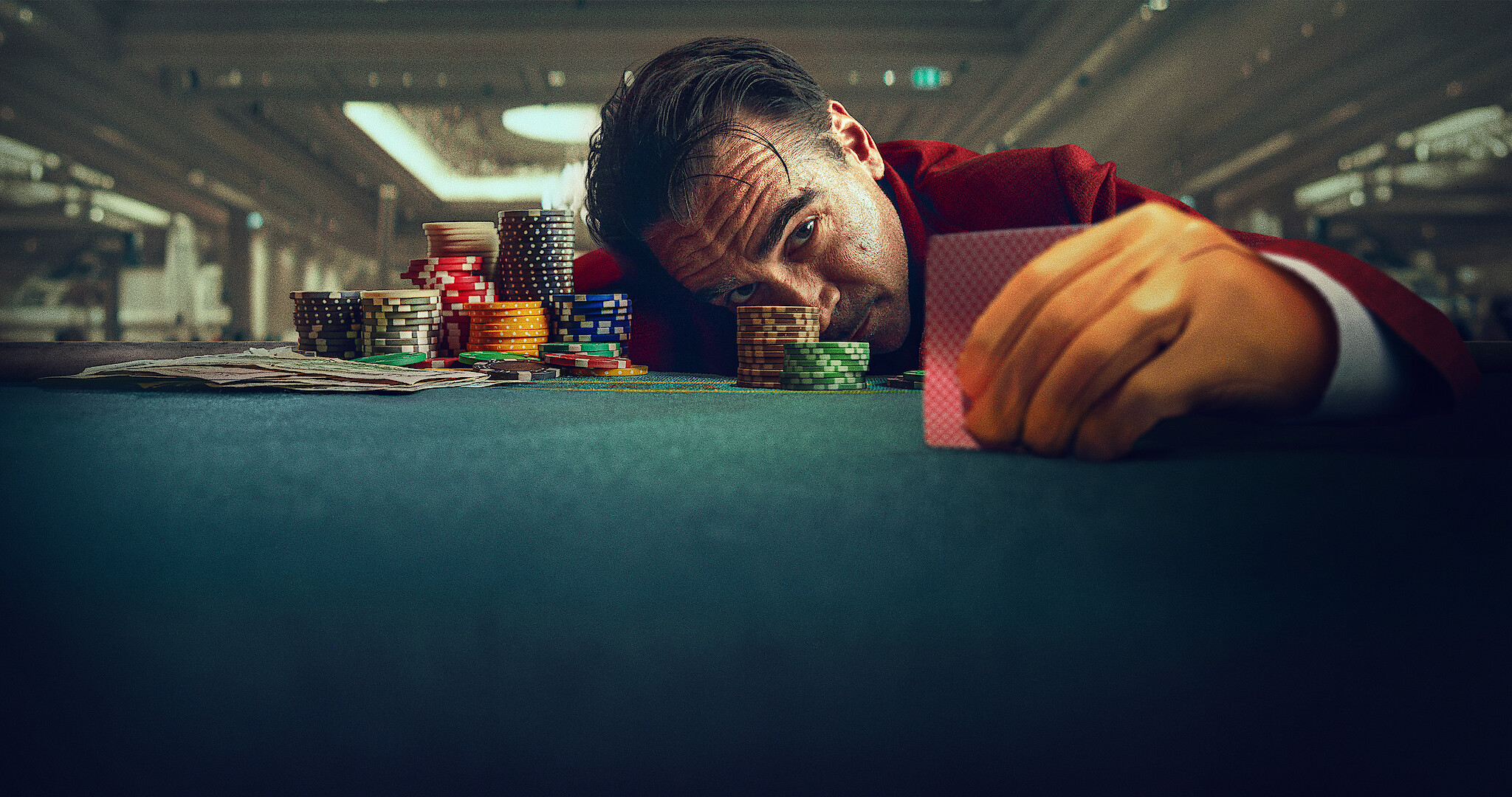 Ballad of a Small Player - Colin Ferrel sitting at a poker table