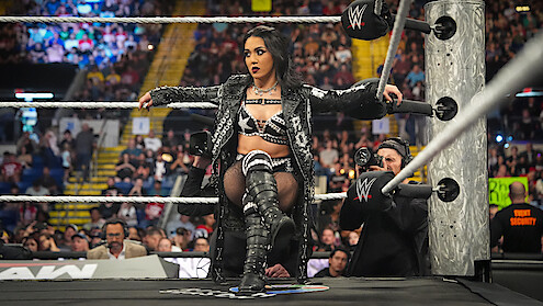 Roxanne Perez sitting on a rope during Monday Night RAW