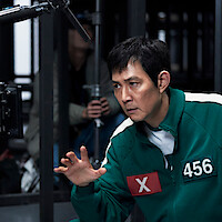 Lee Jung-jae as Seong Gi-hun filming on set in 'Squid Game' Season 2.
