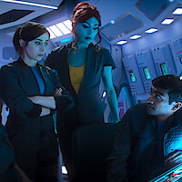 Cristin Milioti, Milanka Brooks, and Paul G. Raymond in Season 7 of ‘Black Mirror’ in Season 7 of ‘Black Mirror’