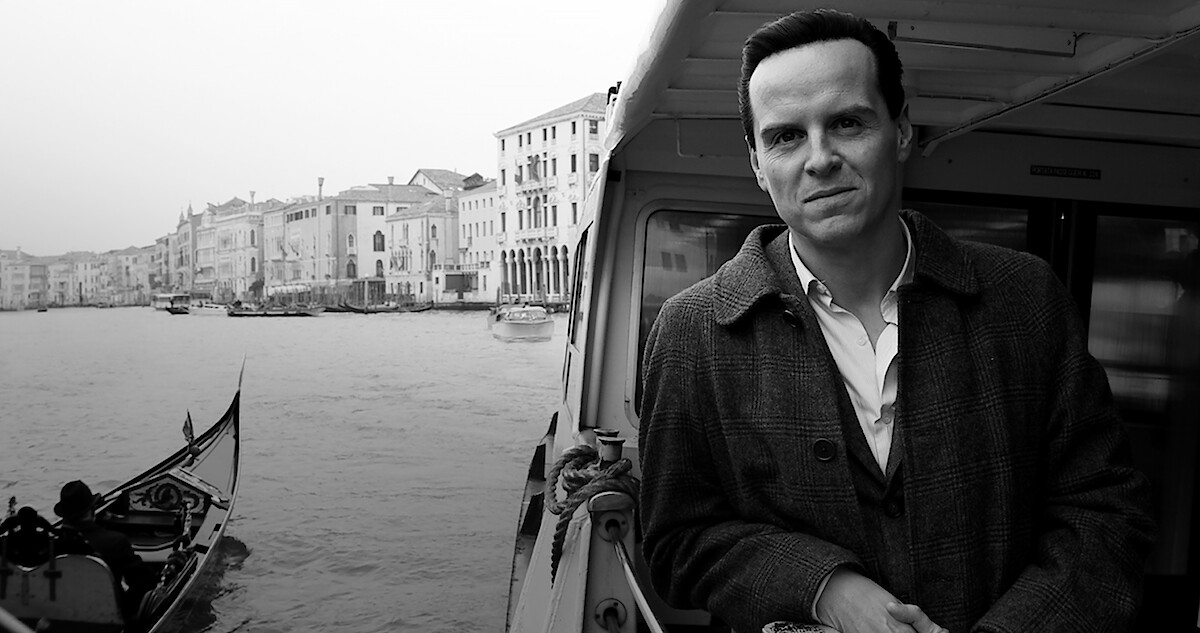 Andrew Scott as Tom Ripley rides on a boat in Venice in 'Ripley'