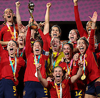 Spain teammates celebrate with the FIFA Women's World Cup Trophy