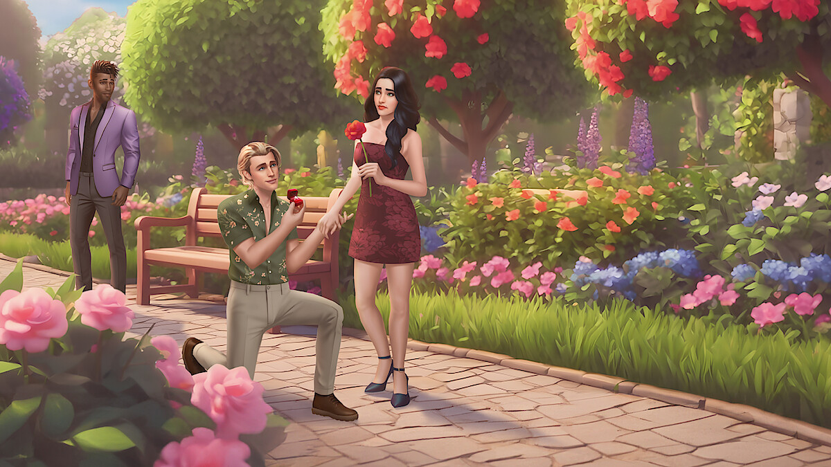 A character from the game is on his knees proposing to another character while a third person looks on. They're in a park, flowers are blooming.